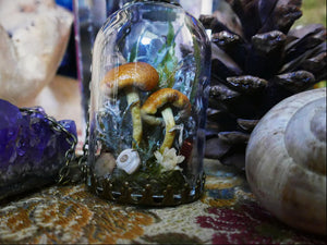 Terrarium pendant with mushrooms